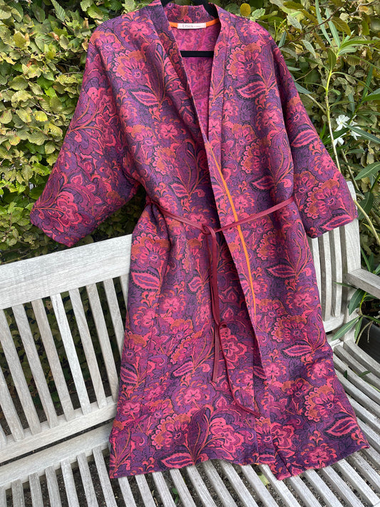 Lange jas in warme tinten